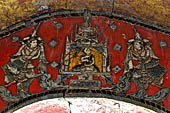 Glass mosaics depicting Buddhist stories lining walls around stupa in Shwe Yaunghwe Kyaung. Buddhist monastery, near Inle Lake. Myanmar.